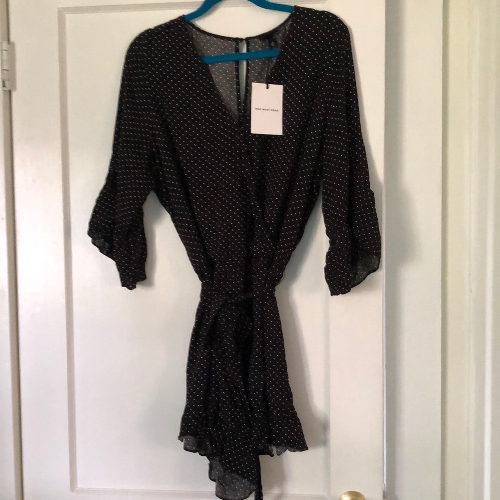 Women’s XL black and white dot jumpsuit.